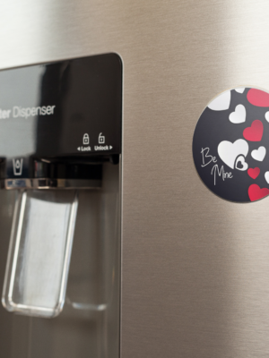 fridge-magnet-mockup-on-a-metallic-fridge-near-the-water-dispenser-a14790